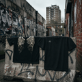 TRACQ. – "FALLEN WINGS" Heavyweight Tee